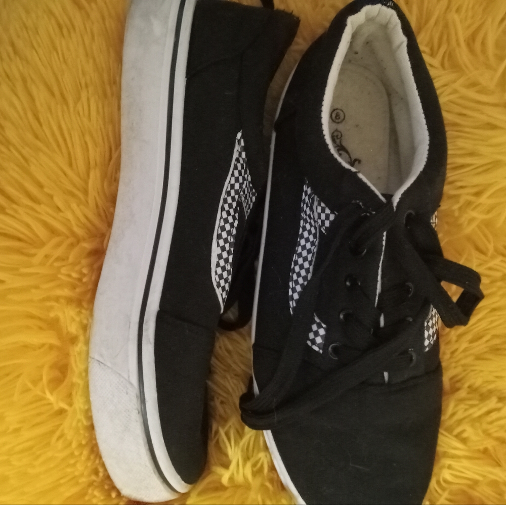 Black and white skater shoes